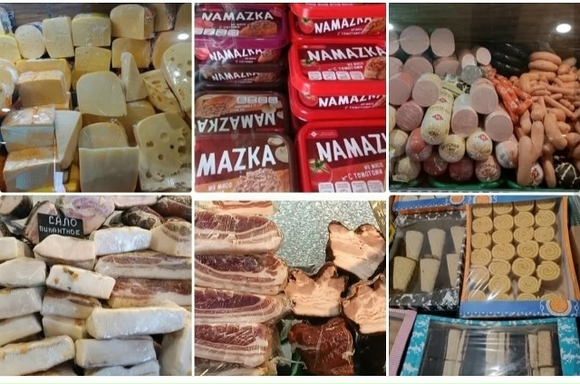 УСИНСК С ТОРЦА ЗДАНИЯ ДОМА БЫТА ПРИВОЗ АССОРТИМЕНТА КА...