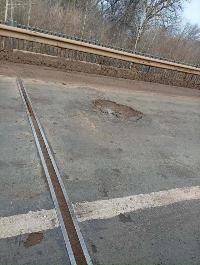 Будьте осторожны! Мост через о. Каютино. Два колеса в ут...